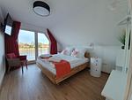Schlafzimmer - Ferienhaus Seeperle Traumblick 7 - Top-Hundeurlaub