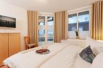 Schlafzimmer - Ferienwohnung Auszeit nur 100 m zum Strand mit Balkon - Top-Hundeurlaub