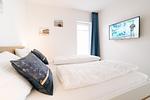 Schlafzimmer mit Smart/TV - Nordsee Oase (50.0.N) - Top-Hundeurlaub