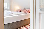 Schlafzimmer - Ferienwohnung Kapitänswohnung - Top-Hundeurlaub