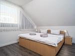 Schlafzimmer mit Doppelbett - Wohnung 3-55 - Top-Hundeurlaub