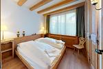 Schlafzimmer - Apartment Muntagna Alva EG - Top-Hundeurlaub