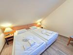 Schlafzimmer - Komfort Ferienwohnung mit 1 Schlafzimmer und Balkon im Dachgeschoss (024) - Top-Hundeurlaub