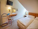 Schlafzimmer - Komfort Ferienwohnung mit 1 Schlafzimmer und Balkon im Dachgeschoss (023) - Top-Hundeurlaub
