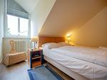 Schlafzimmer - Komfort Ferienwohnung mit 1 Schlafzimmer und Balkon im Dachgeschoss (023) - Top-Hundeurlaub