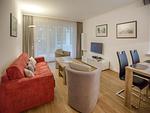 Wohnzimmer - Komfortplus Ferienwohnung mit 1 Schlafzimmer und Terrasse im Erdgeschoss (033) - Top-Hundeurlaub