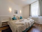 Schlafzimmer - Komfortplus Ferienwohnung mit 1 Schlafzimmer und Balkon im Obergeschoss (046) - Top-Hundeurlaub