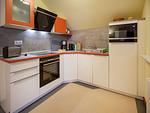 Küche / Küchenzeile - Komfortplus Ferienwohnung mit 2 Schlafzimmern und Balkon im Dachgeschoss (048) - Top-Hundeurlaub