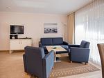Wohnzimmer - Komfortplus Ferienwohnung mit 1 Schlafzimmer und Terrasse im Erdgeschoss (063) - Top-Hundeurlaub