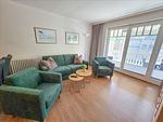 Wohnzimmer - Klassik Ferienwohnung mit 2 Schlafzimmern und Balkon im Obergeschoss (065) - Top-Hundeurlaub