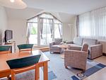Wohnzimmer - Komfort Ferienwohnung mit 1 Schlafzimmer und Balkon im Dachgeschoss (109) - Top-Hundeurlaub