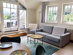 Wohnzimmer - Komfort Ferienwohnung mit 1 Schlafzimmer und Balkon im Dachgeschoss (123) - Top-Hundeurlaub