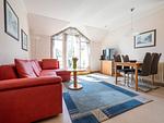 Wohnzimmer - Komfort Ferienwohnung mit 1 Schlafzimmer und Balkon im Dachgeschoss (161) - Top-Hundeurlaub