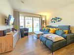 Wohnzimmer - Komfortplus Ferienwohnung mit 2 Schlafzimmern und Terrasse im Erdgeschoss (166) - Top-Hundeurlaub