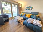 Wohnzimmer - Komfortplus Ferienwohnung mit 2 Schlafzimmern und Terrasse im Erdgeschoss (166) - Top-Hundeurlaub