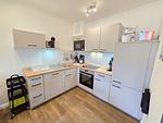 Küche / Küchenzeile - Komfortplus Ferienwohnung mit 2 Schlafzimmern und Terrasse im Erdgeschoss (166) - Top-Hundeurlaub