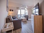 Wohnzimmer - Komfortplus Ferienwohnung mit 1 Schlafzimmer und Balkon im Dachgeschoss (173) - Top-Hundeurlaub