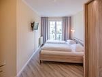Schlafzimmer - Komfortplus Ferienwohnung mit 1 Schlafzimmer und Balkon im Dachgeschoss (173) - Top-Hundeurlaub