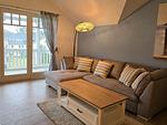 Wohnzimmer - Komfortplus Ferienwohnung mit 1 Schlafzimmer und Balkon im Dachgeschoss (184) - Top-Hundeurlaub
