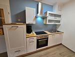 Küche / Küchenzeile - Komfortplus Ferienwohnung mit 1 Schlafzimmer und Balkon im Dachgeschoss (184) - Top-Hundeurlaub
