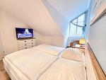 Schlafzimmer - Komfortplus Ferienwohnung mit 1 Schlafzimmer und Balkon im Dachgeschoss (184) - Top-Hundeurlaub