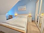 Schlafzimmer - Komfortplus Ferienwohnung mit 1 Schlafzimmer und Balkon im Dachgeschoss (184) - Top-Hundeurlaub