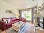 Wohnzimmer - Komfortplus Ferienwohnung mit 1 Schlafzimmer und Terrasse im Erdgeschoss (212) - Top-Hundeurlaub