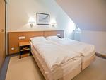 Schlafzimmer - Komfort Ferienwohnung mit 1 Schlafzimmer und Balkon im Dachgeschoss (185) - Top-Hundeurlaub