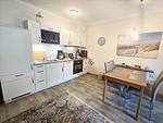 Küche / Küchenzeile - Komfort Ferienwohnung mit 1 Schlafzimmer und Terrasse im Erdgeschoss (220) - Top-Hundeurlaub