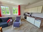 Küche / Küchenzeile - Komfortplus Ferienwohnung mit 1 Schlafzimmer und Balkon im Dachgeschoss (231) - Top-Hundeurlaub