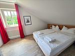 Schlafzimmer - Komfortplus Ferienwohnung mit 1 Schlafzimmer und Balkon im Dachgeschoss (231) - Top-Hundeurlaub