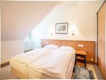 Schlafzimmer - Komfort Ferienwohnung mit 1 Schlafzimmer und Balkon im Dachgeschoss (234) - Top-Hundeurlaub