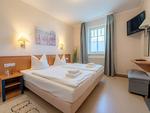 Schlafzimmer - Komfort Ferienwohnung mit 1 Schlafzimmer und Balkon im Obergeschoss (241) - Top-Hundeurlaub