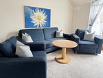 Wohnzimmer - Komfortplus Ferienwohnung mit 1 Schlafzimmer und Balkon im Dachgeschoss (247) - Top-Hundeurlaub
