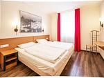 Schlafzimmer - Komfortplus Ferienwohnung mit 1 Schlafzimmer und Balkon im Obergeschoss (255) - Top-Hundeurlaub