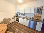 Küche / Küchenzeile - Komfortplus Ferienwohnung mit 1 Schlafzimmer und Balkon im Obergeschoss (255) - Top-Hundeurlaub