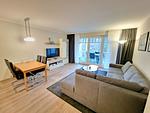 Wohnzimmer - Komfortplus Ferienwohnung mit 1 Schlafzimmer und Balkon im Obergeschoss (290) - Top-Hundeurlaub