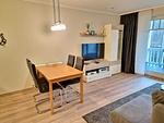 Wohnzimmer - Komfortplus Ferienwohnung mit 1 Schlafzimmer und Balkon im Obergeschoss (290) - Top-Hundeurlaub