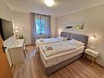 Schlafzimmer - Komfortplus Ferienwohnung mit 1 Schlafzimmer und Balkon im Obergeschoss (290) - Top-Hundeurlaub