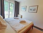 Schlafzimmer - Komfort Ferienwohnung mit 1 Schlafzimmer und Balkon im Dachgeschoss (282) - Top-Hundeurlaub