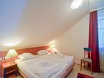 Schlafzimmer - Komfort Ferienwohnung mit 1 Schlafzimmer und Balkon im Dachgeschoss (308) - Top-Hundeurlaub