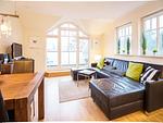 Wohnzimmer - Komfortplus Ferienwohnung mit 1 Schlafzimmern und Balkon im Dachgeschoss (303) - Top-Hundeurlaub
