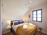 Schlafzimmer - Premium Reetdachvilla mit 3 Schlafzimmern, Sauna und Kamin (E16) - Top-Hundeurlaub