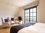 Schlafzimmer - Premium Reetdachvilla mit 2 Schlafzimmern, Sauna und Kamin (E25) - Top-Hundeurlaub