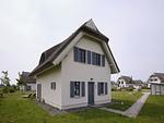 Hauptansicht - Premium Reetdachvilla mit 2 Schlafzimmern, Sauna und Kamin (E25) - Top-Hundeurlaub