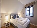 Schlafzimmer - Premium Reetdachvilla mit 3 Schlafzimmern, Sauna und Kamin (F10) - Top-Hundeurlaub