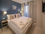 Schlafzimmer - Skysuite mit freiem Meerblick, Dachterrasse und Balkon (NP/502) - Top-Hundeurlaub
