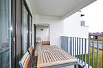 Balkon mit Gartenmöbel - Deichhäuser Anna Küste 3-23 - Top-Hundeurlaub