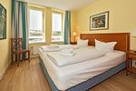 Schlafzimmer mit Doppelbett - Strand-Park 101 - Top-Hundeurlaub