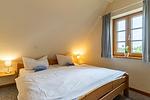 Schlafzimmer - Landhaus Liebheimelig, Hohe Düne - Top-Hundeurlaub